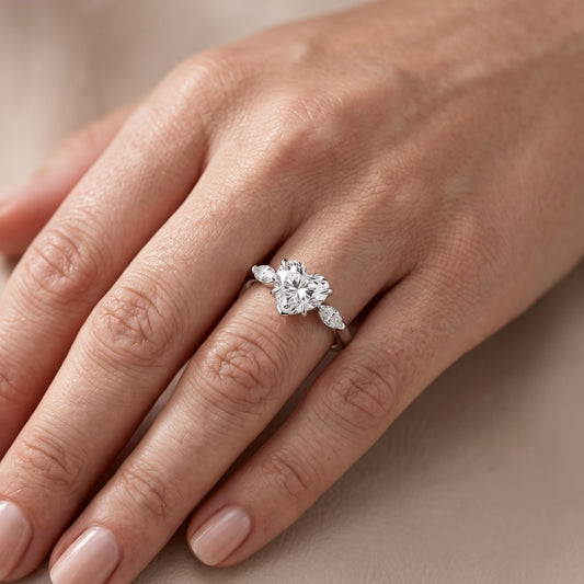 Lyra Three-Stone Heart Diamond Engagement Ring in Platinum - lifestyle.jpg