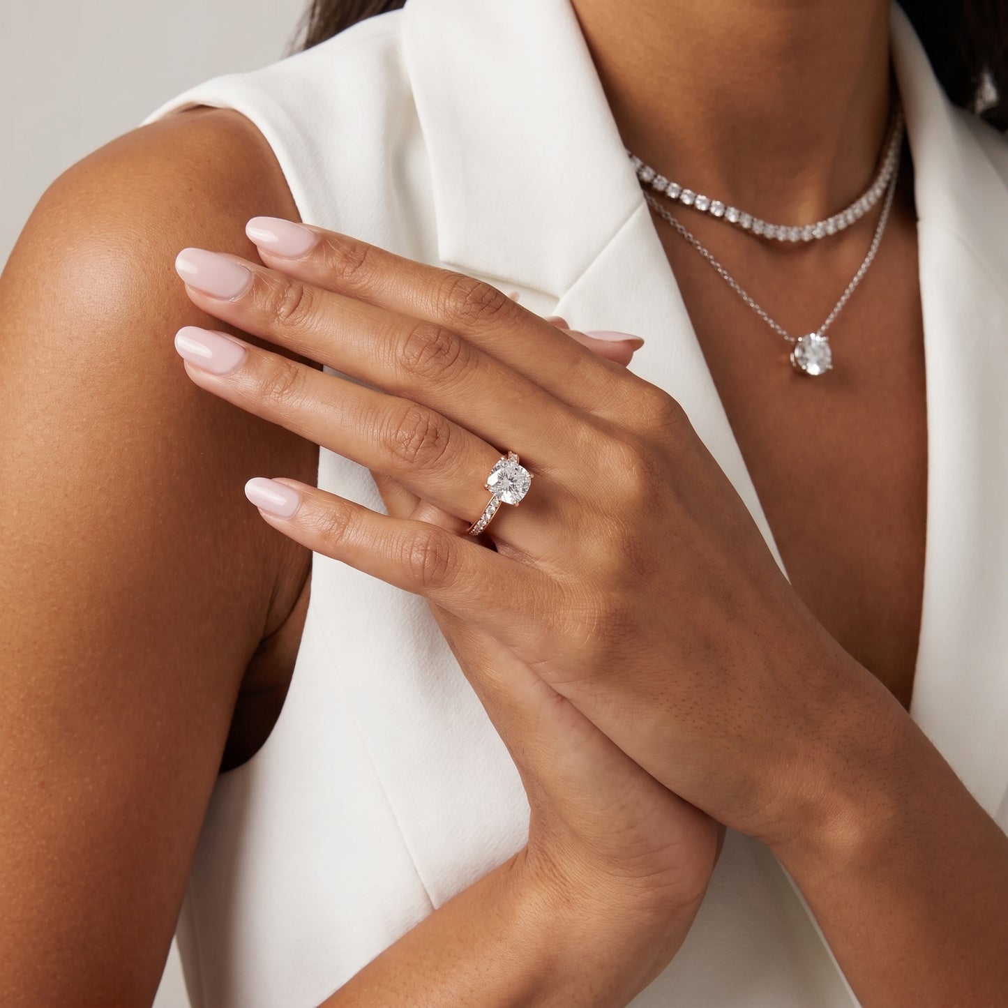 Rhea Sidestone Pavé Cushion Diamond Engagement Ring in Rose Gold - model.jpg