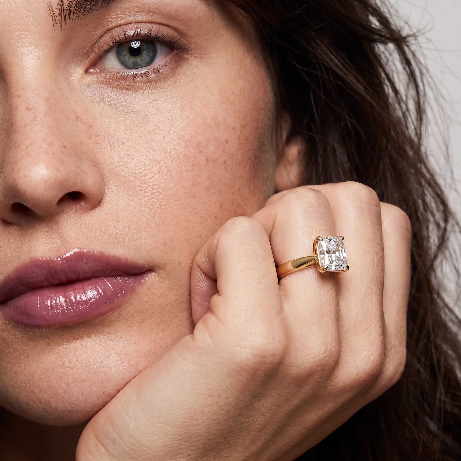 Lucia Solitaire Six-Prong Radiant Diamond Engagement Ring in Yellow Gold - model.jpg
