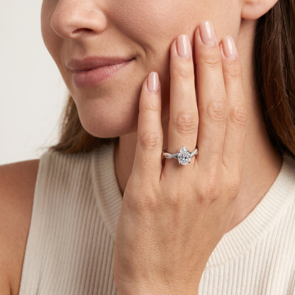 Twisted Side Stone Pear Diamond Engagement Ring in Silver - model.jpg