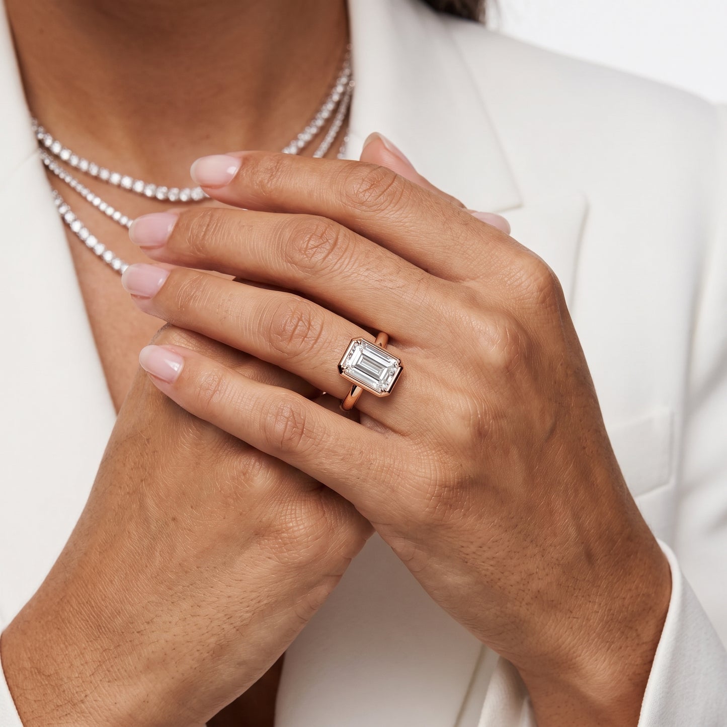 Alina Bezel Solitaire Emerald Diamond Ring in Rose Gold - model.jpg