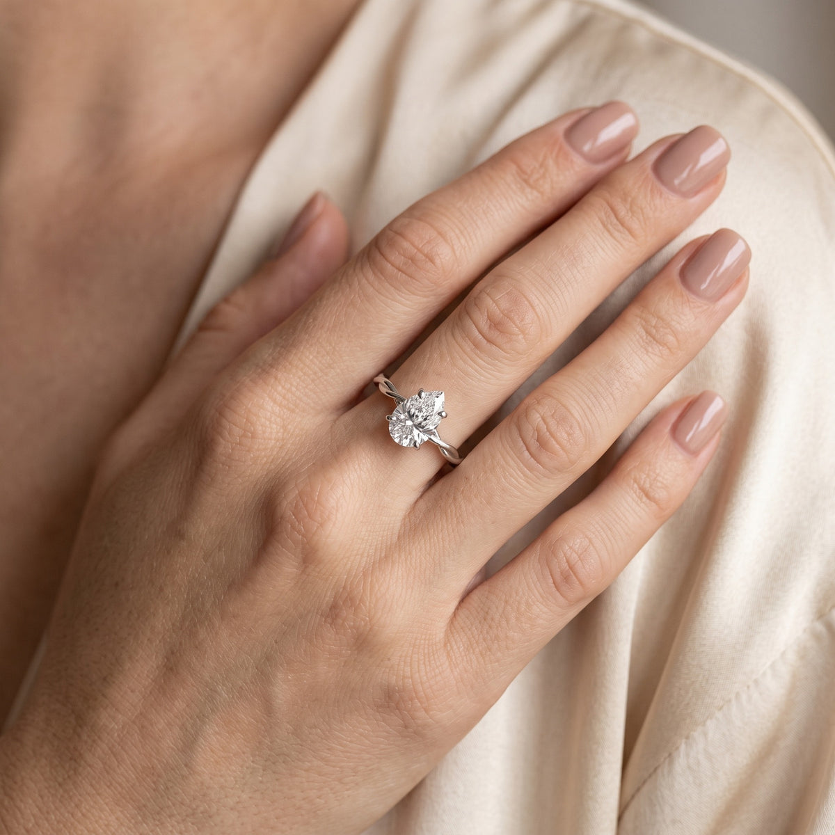 Iris Twist Pear Diamond Engagement Ring in Platinum - model.jpg