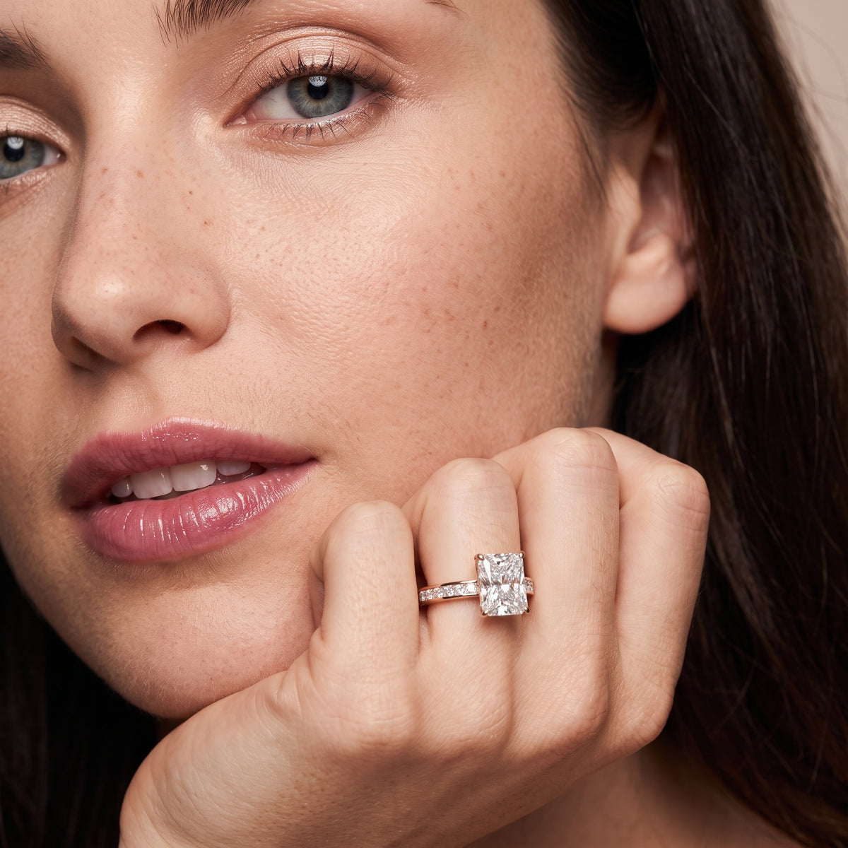 Brielle Channel Set Solitaire Radiant Diamond Engagement Ring in Rose Gold - model.jpg