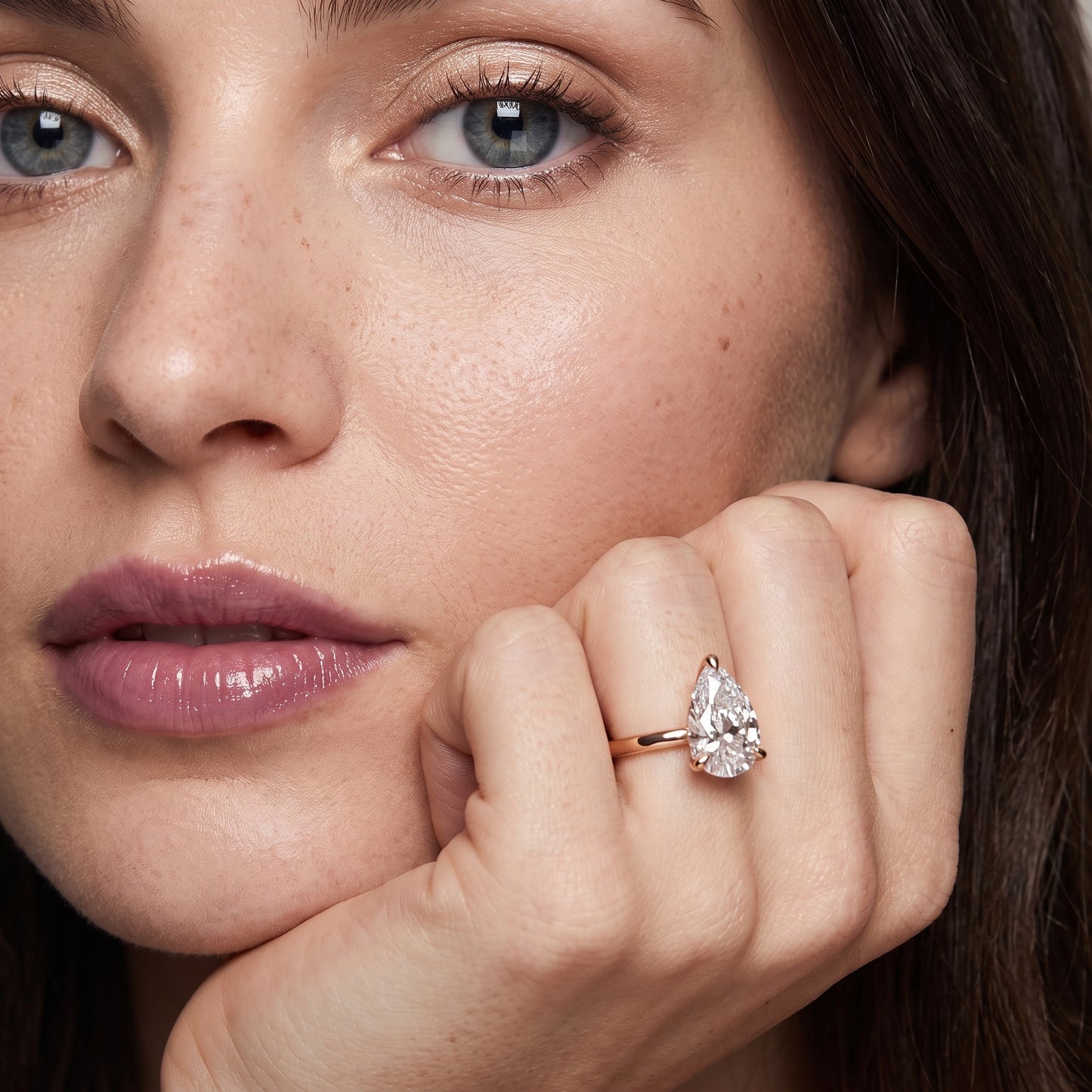 Nella Petite Solitaire Pear Diamond Engagement Ring in Rose Gold - model.jpg