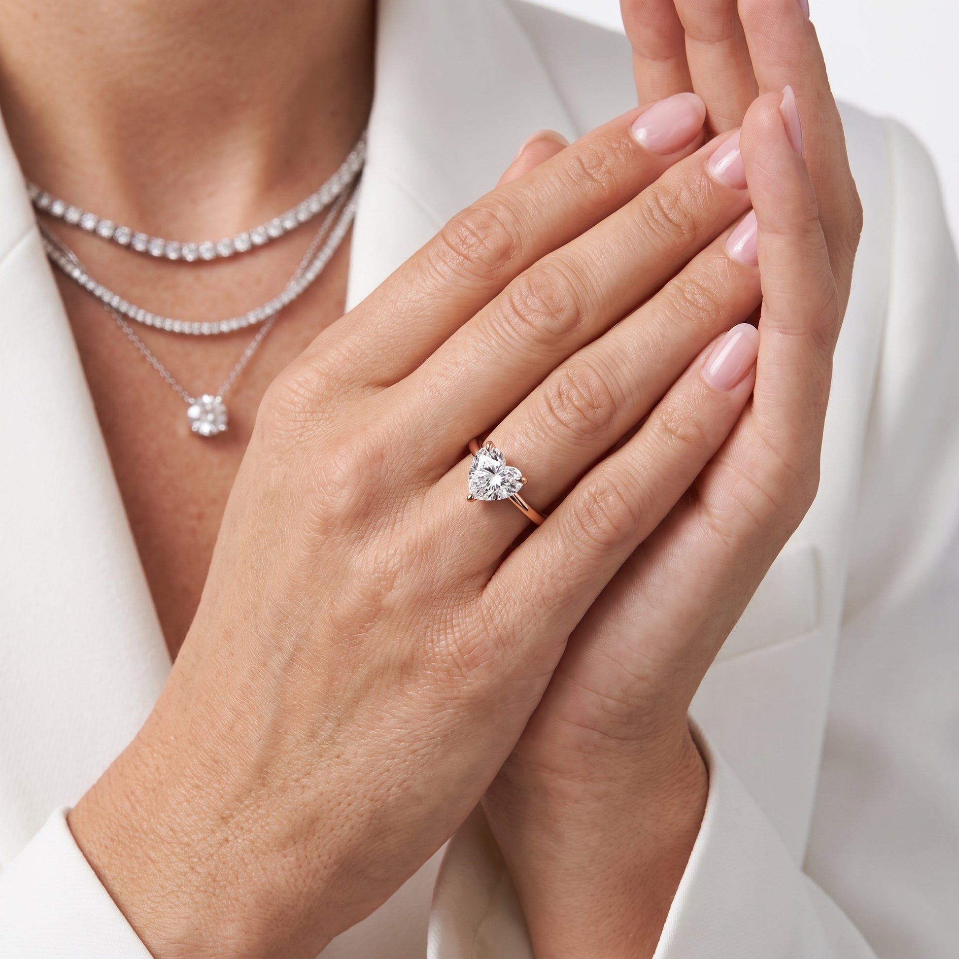 Nella Petite Solitaire Heart Diamond Engagement Ring in Rose Gold - model.jpg