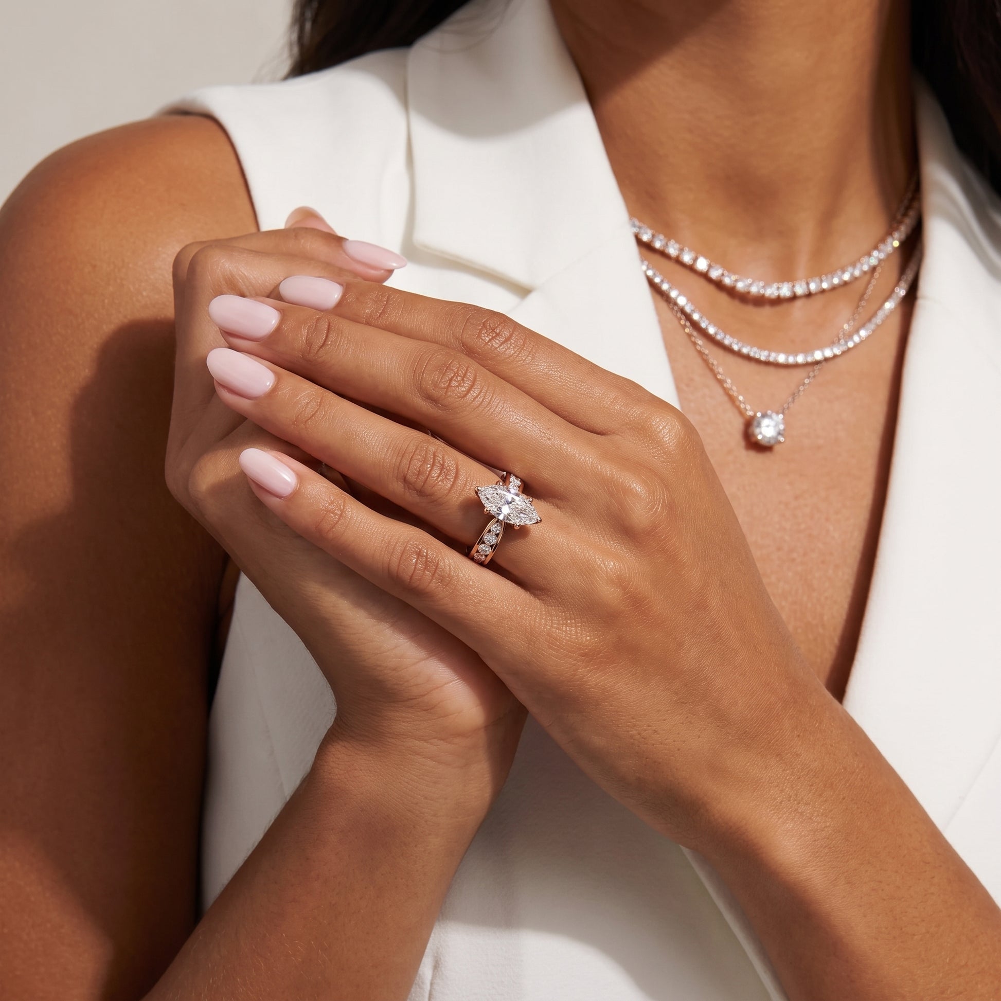 Noor Channel Set Sidestone Marquise Diamond Engagement Ring in Rose Gold - model.jpg
