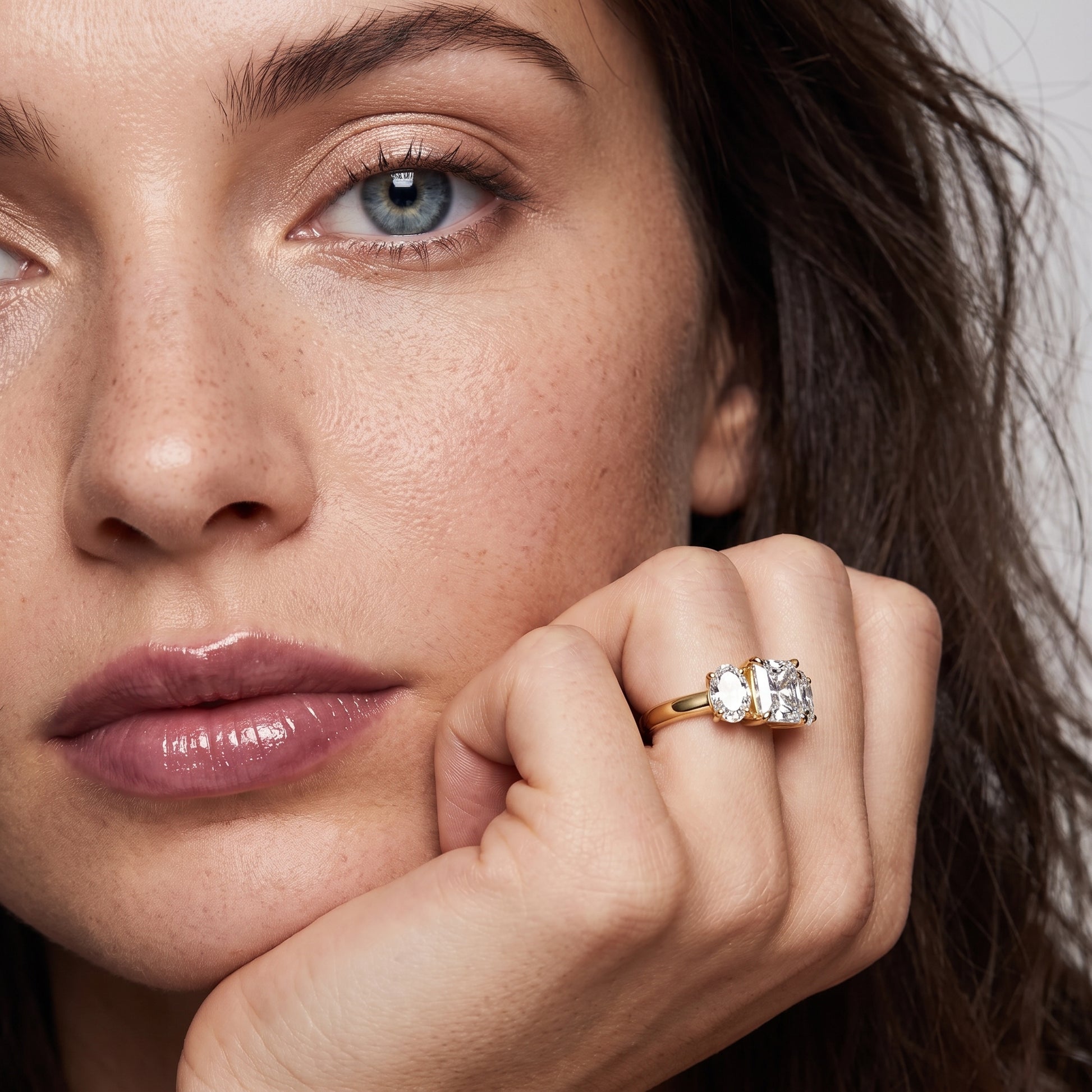 Lila Three-Stone Radiant Diamond Ring in Yellow Gold - model.jpg