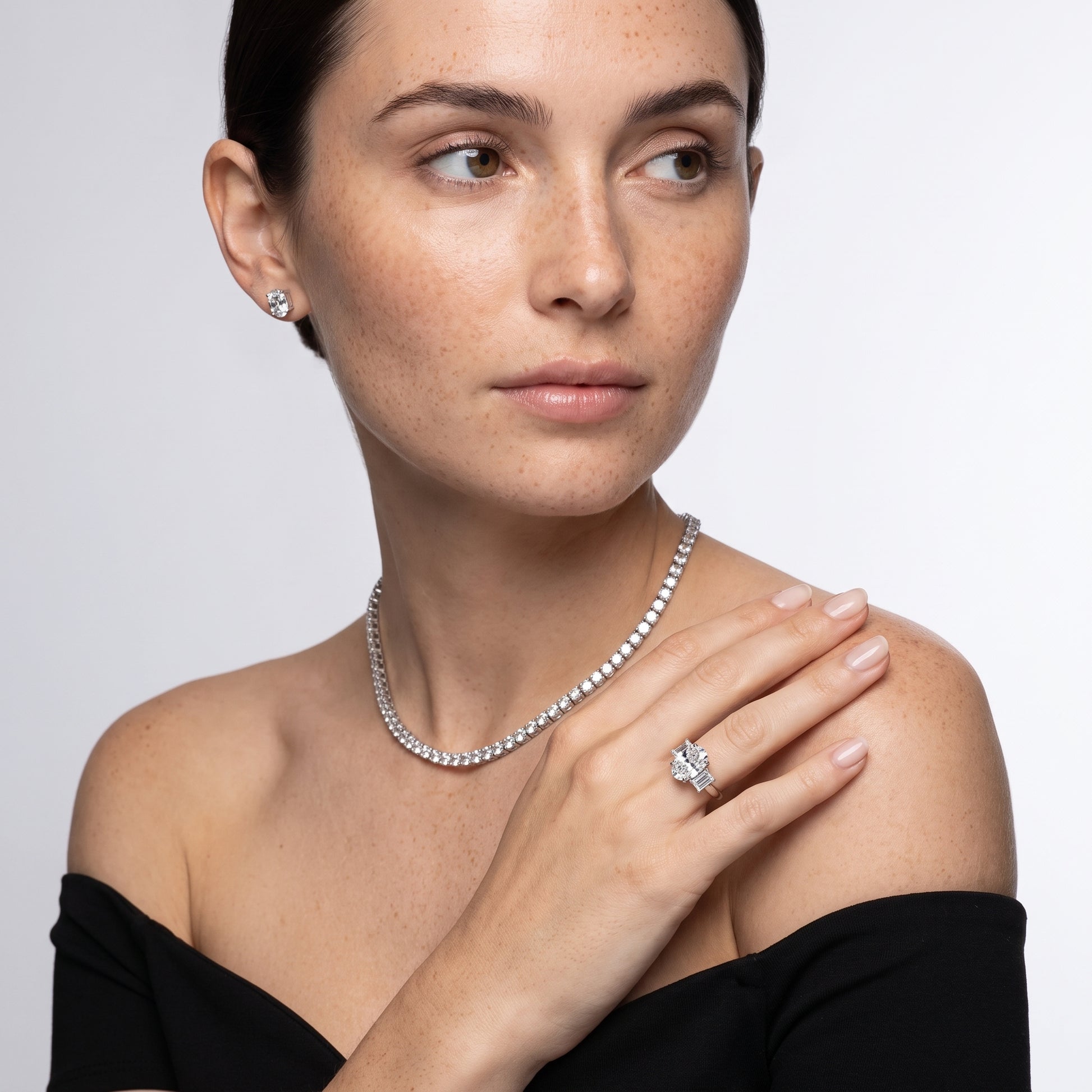Zoe Three-Stone Oval Diamond Ring in Platinum - model.jpg