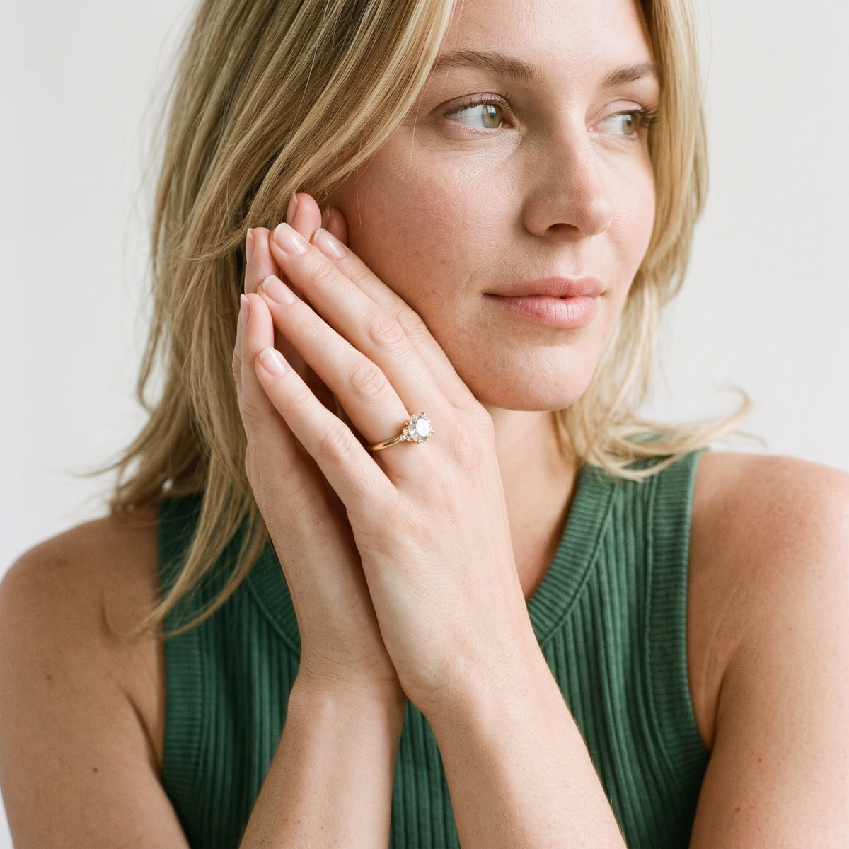 Peony East-West Hidden Halo Round Diamond Engagement Ring in Yellow Gold - model.jpg
