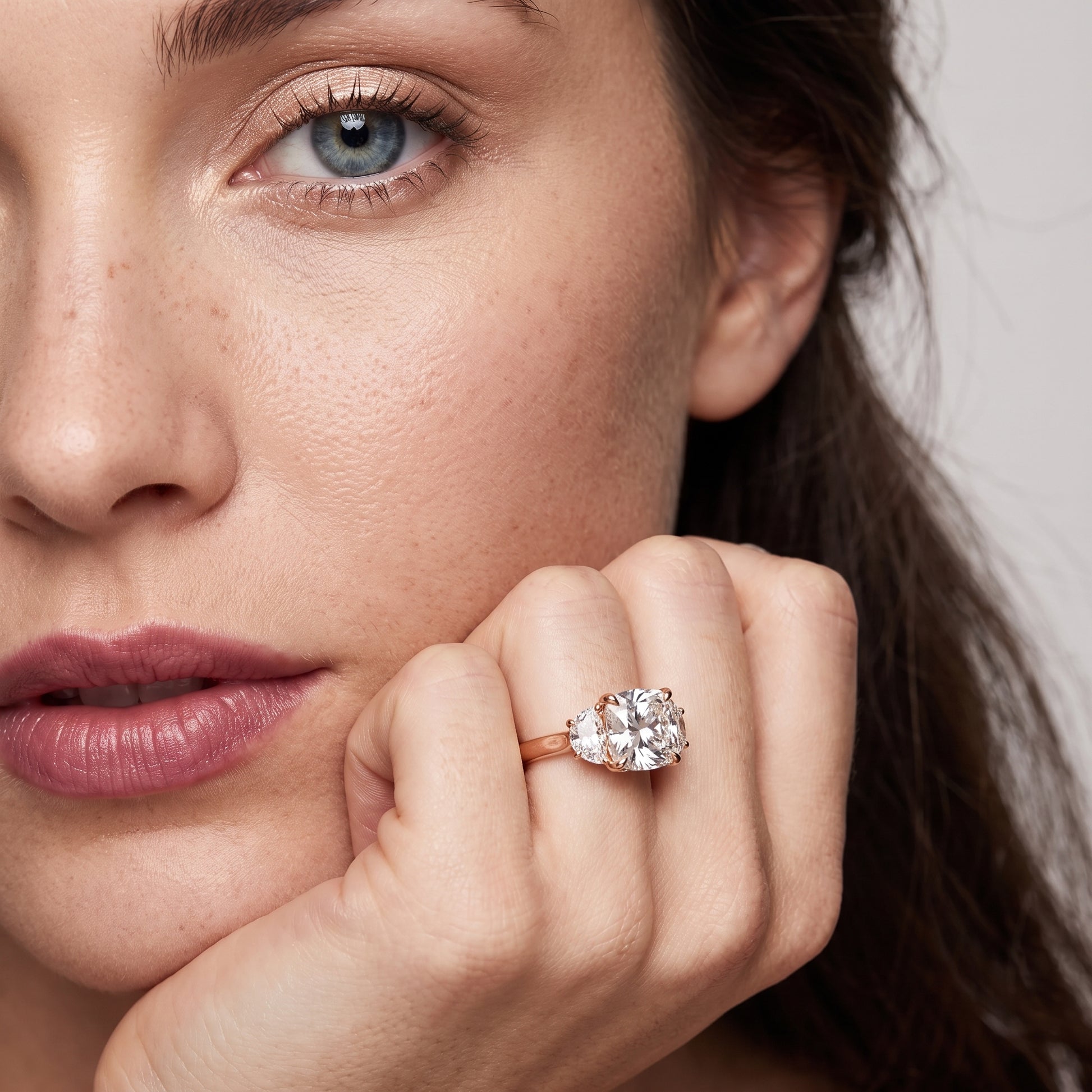 Romy Three-Stone Cushion Diamond Engagement Ring in Rose Gold - model.jpg