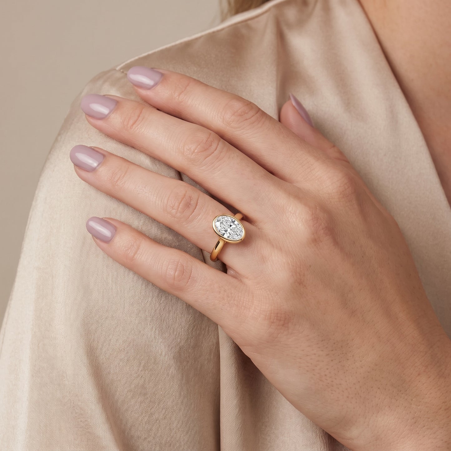 Jolie Bezel Solitaire Oval Diamond Engagement Ring in Yellow Gold - model.jpg