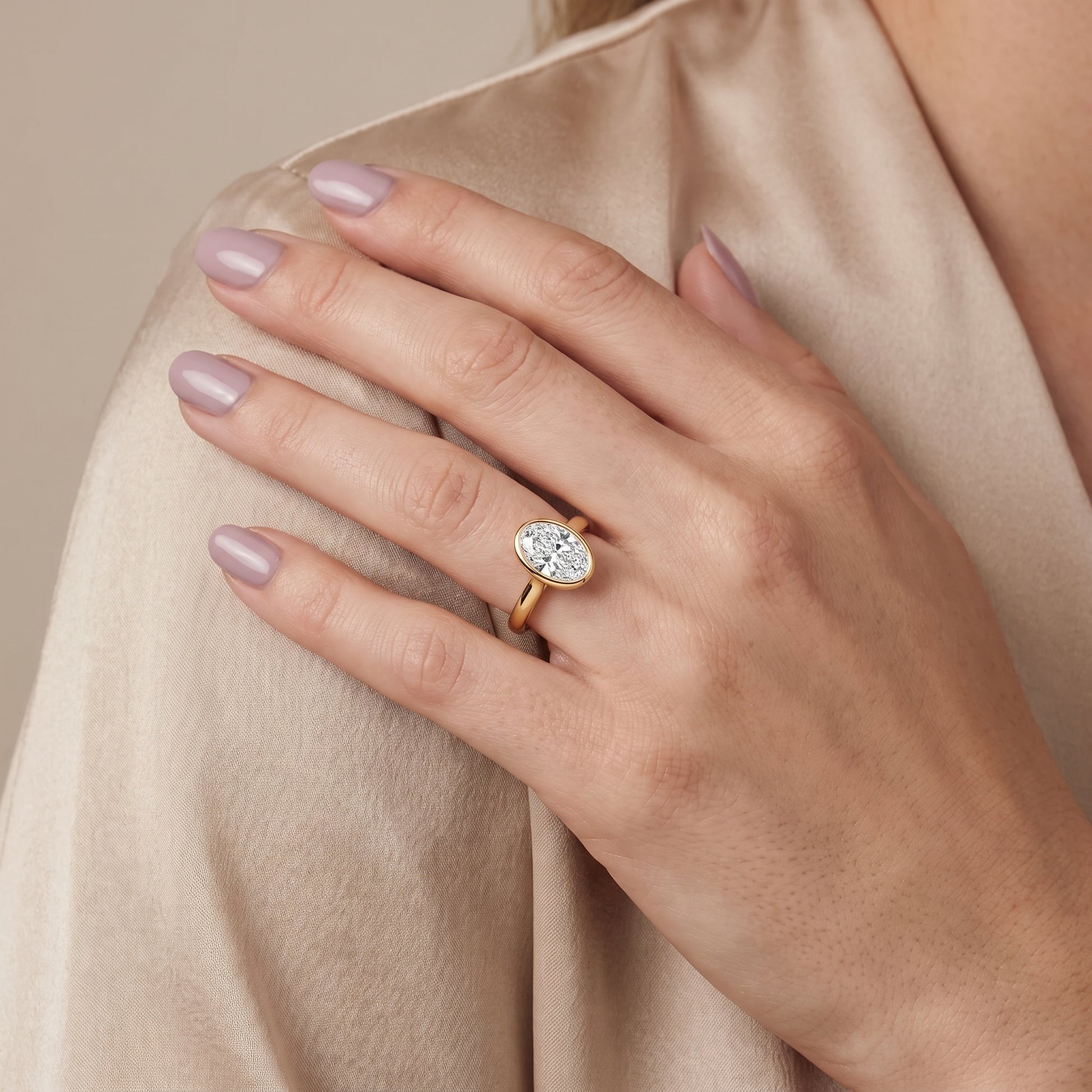 Jolie Bezel Solitaire Oval Diamond Engagement Ring in Yellow Gold - model.jpg