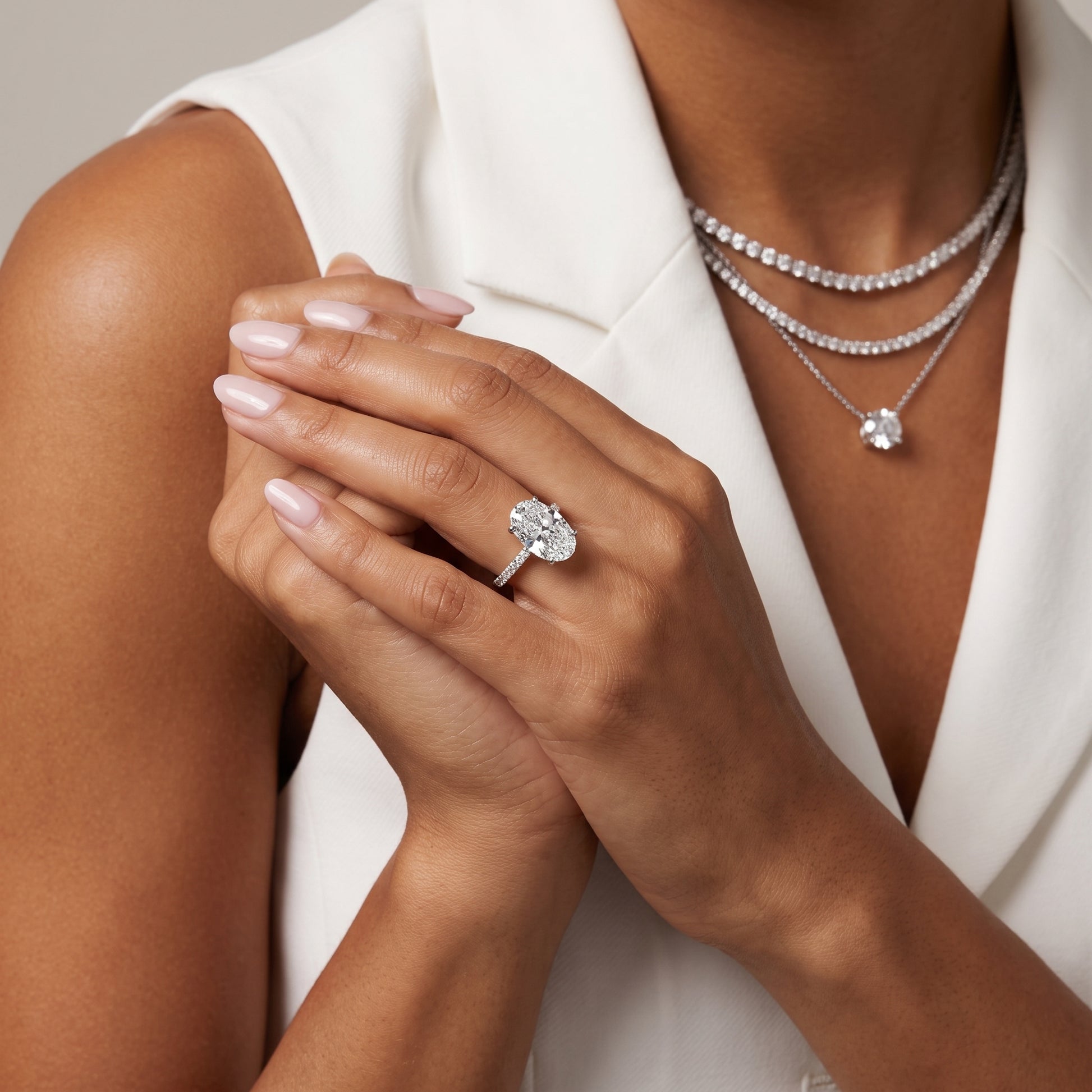 Juna French Pavé Solitaire Oval Diamond Engagement Ring in White Gold - model.jpg