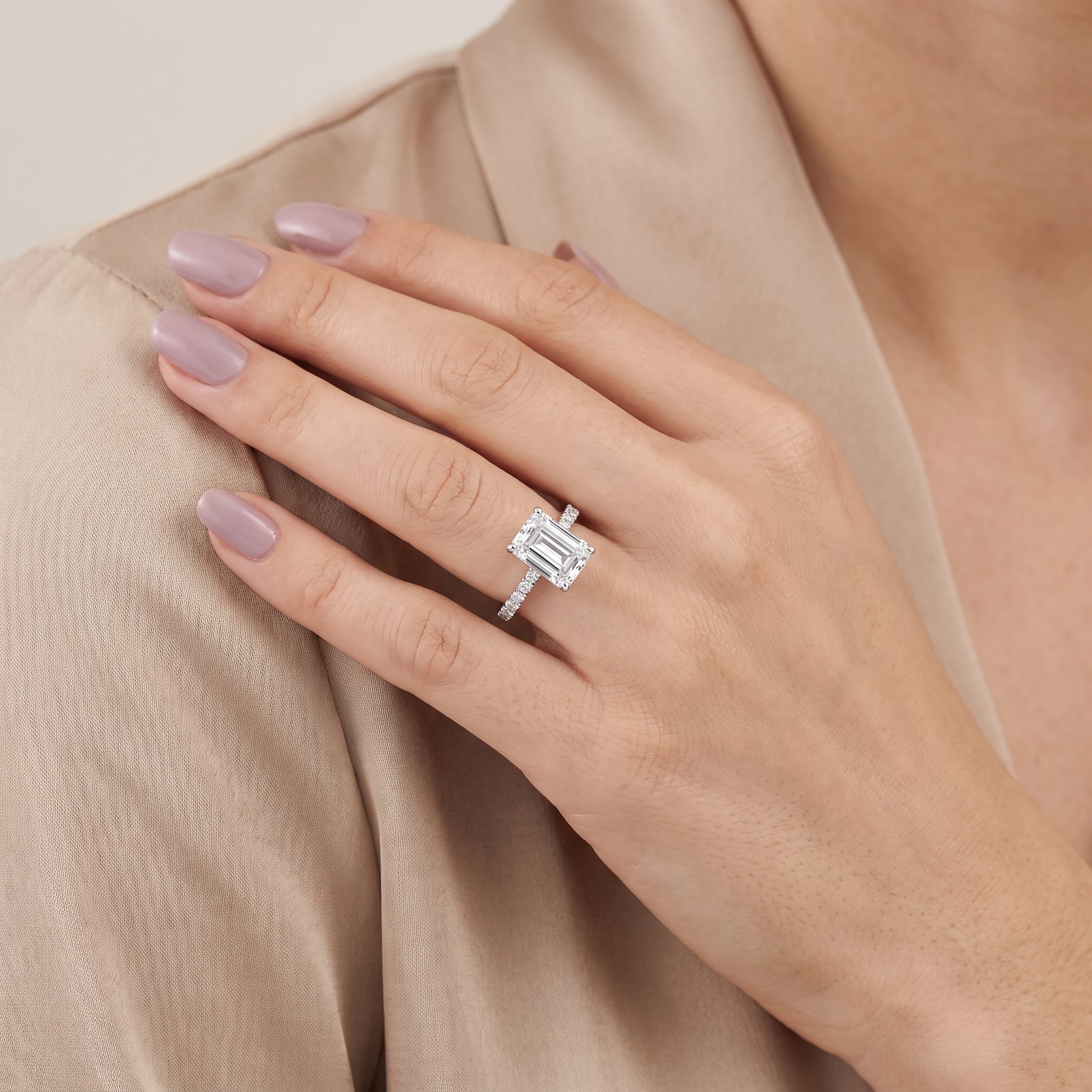 Juna French Pavé Solitaire Emerald Diamond Engagement Ring in Platinum - model.jpg