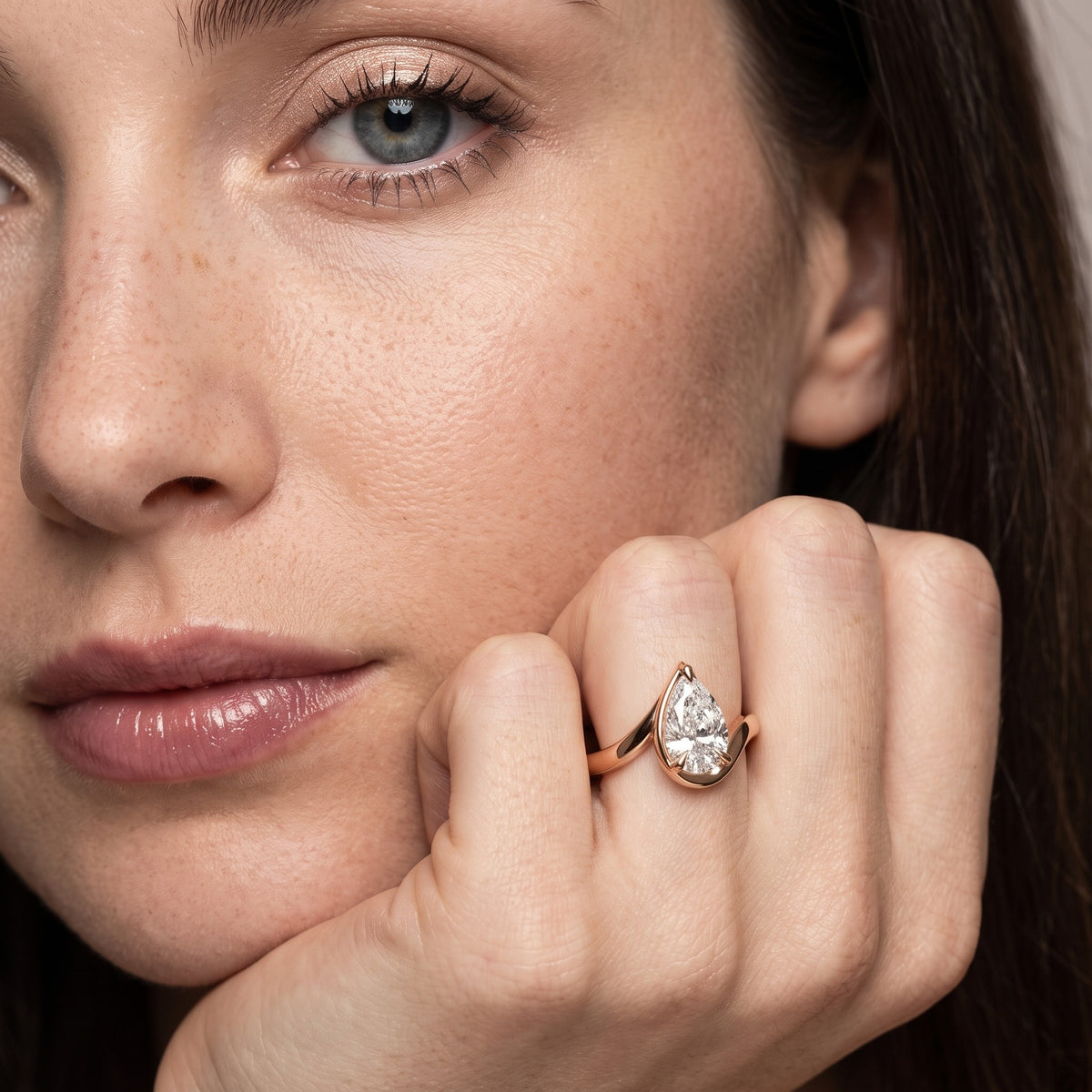 Tabitha Bypass Partial Bezel Pear Diamond Engagement Ring in Rose Gold - model.jpg