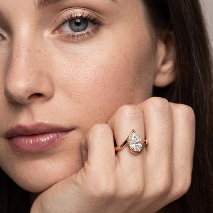 Tabitha Bypass Partial Bezel Pear Diamond Engagement Ring in Rose Gold - model.jpg