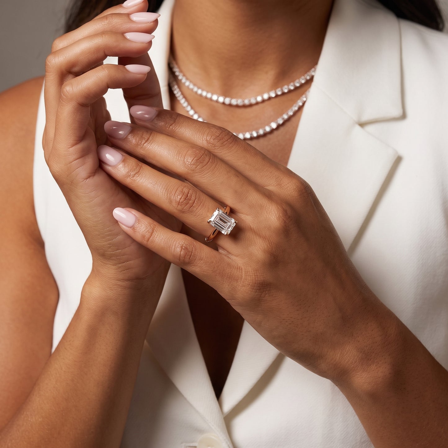 Amira Six-Prong Solitaire Emerald Diamond Engagement Ring in Rose Gold - model.jpg