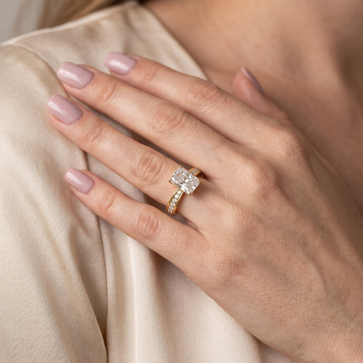 Rhea Sidestone Pavé Radiant Diamond Engagement Ring in Yellow Gold - model.jpg