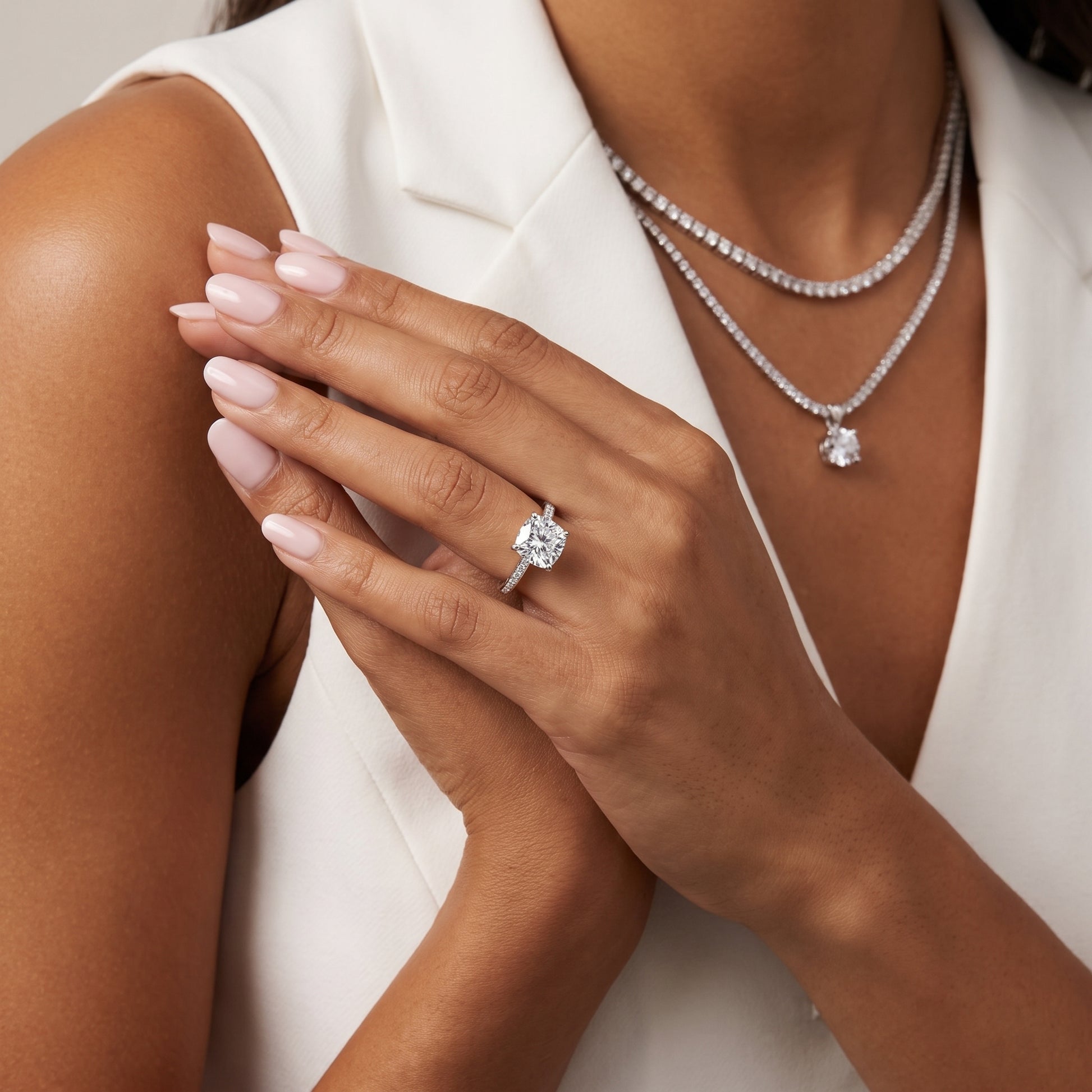 Naia Hidden Halo Cushion Diamond Ring in Platinum - model.jpg