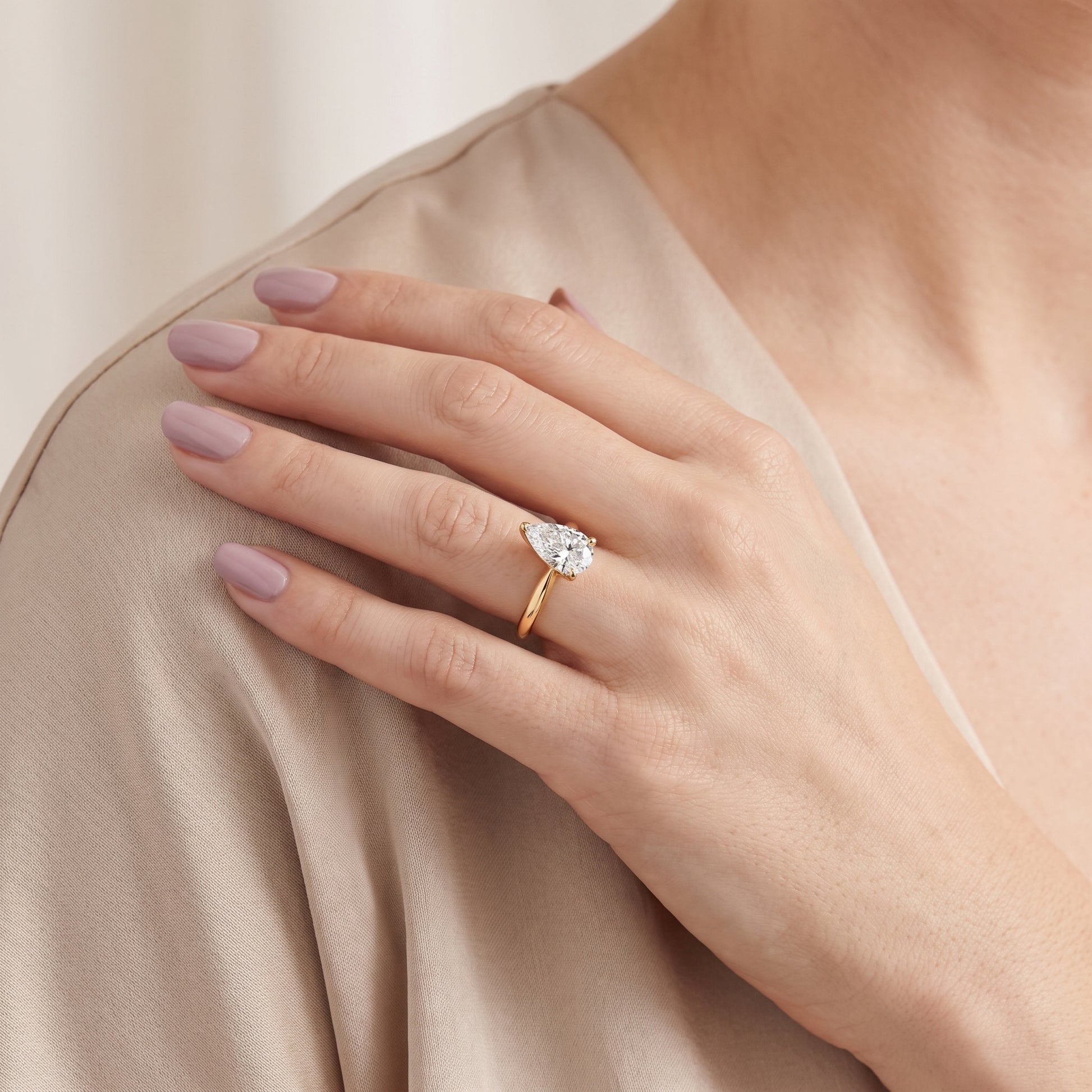 Wren Solitaire Pear Diamond Ring in Yellow Gold - model.jpg