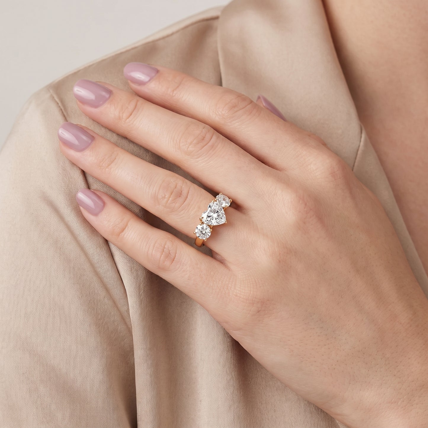 Esme Three-Stone Tapered Heart Diamond Ring in Yellow Gold - model.jpg