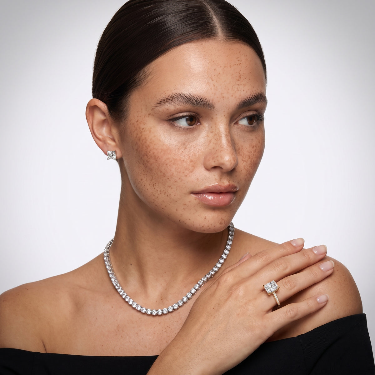 Tessa Solitaire Channel Set Radiant Diamond Engagement Ring in Yellow Gold - model.jpg