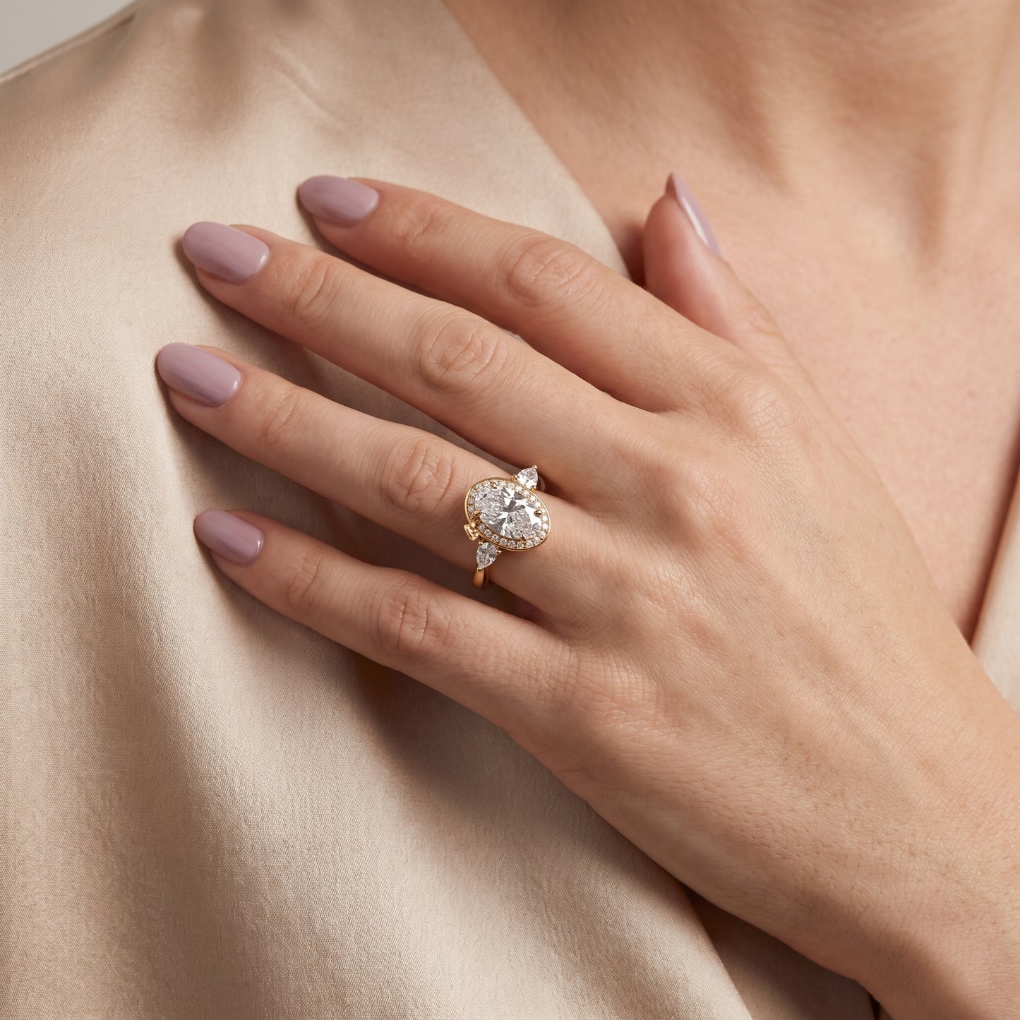 Eliza Halo Sidestone Oval Diamond Engagement Ring in Yellow Gold - model.jpg