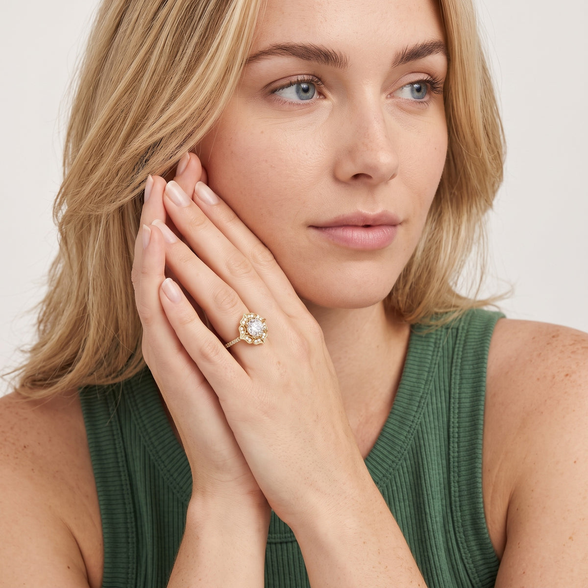 Caitlin Floral Halo Round Diamond Engagement Ring in Rose Gold - model.jpg