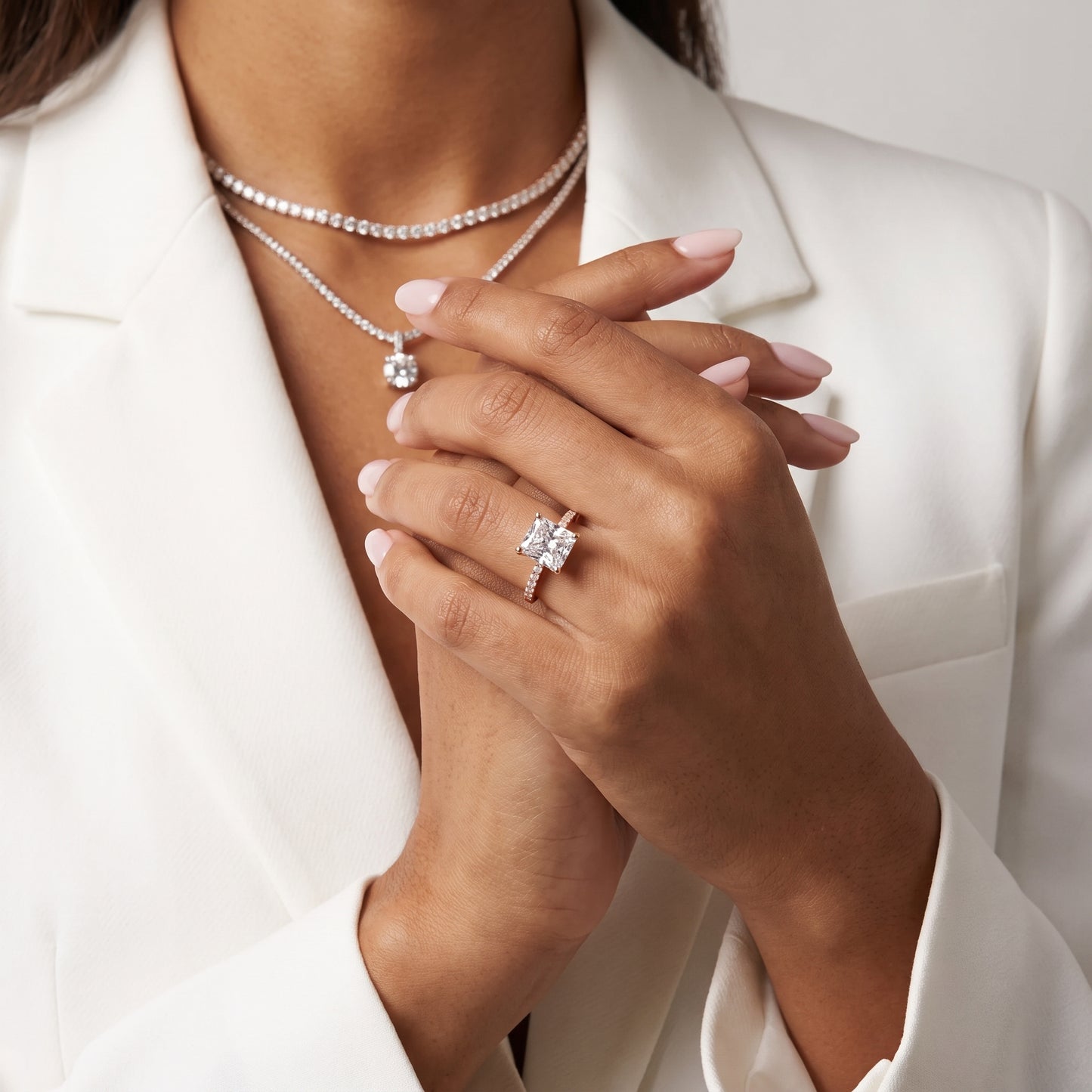 Rosie Solitaire Basket Radiant Diamond Engagement Ring in Rose Gold - model.jpg