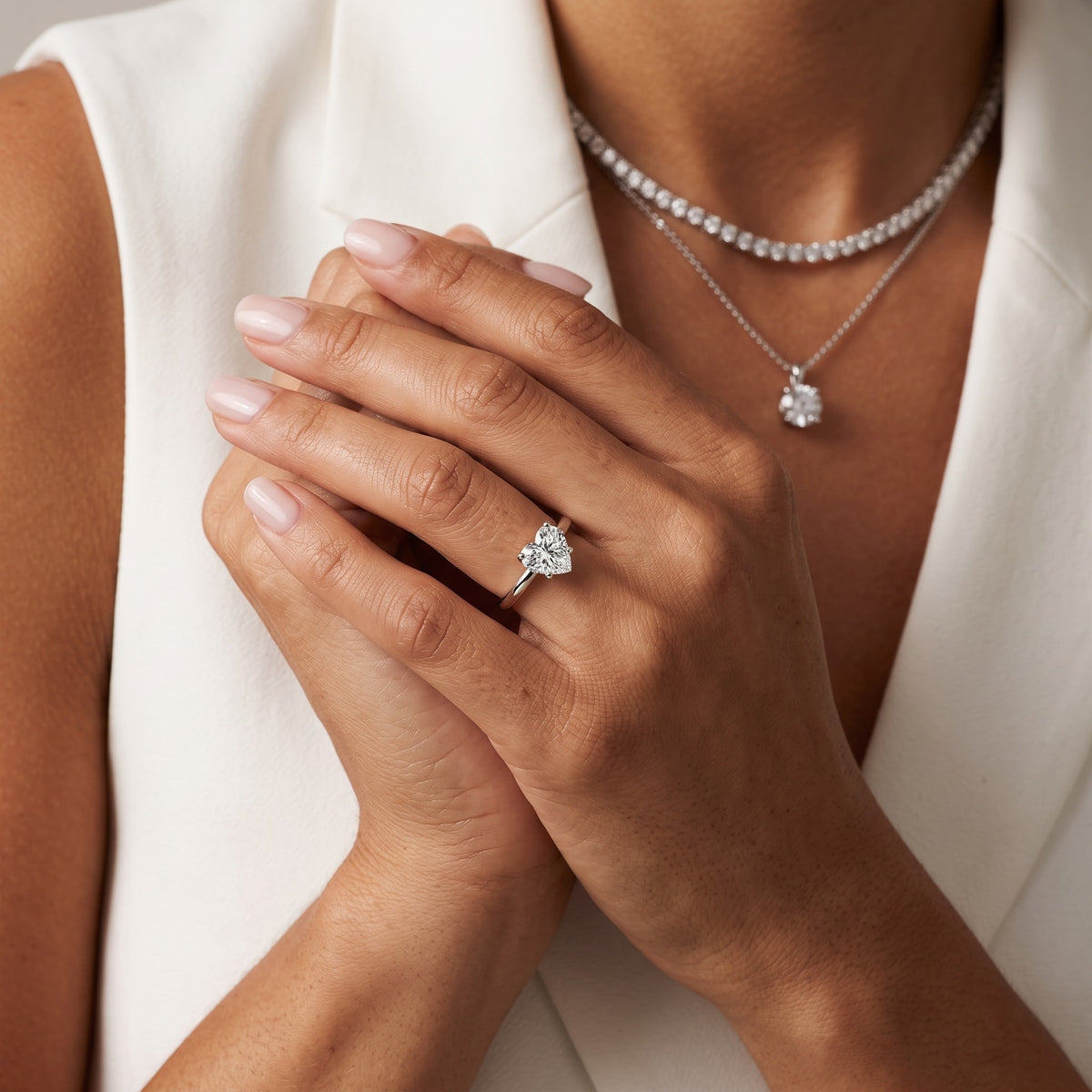 Charlotte Charm Solitaire Heart Diamond Engagement Ring in Silver - model.jpg