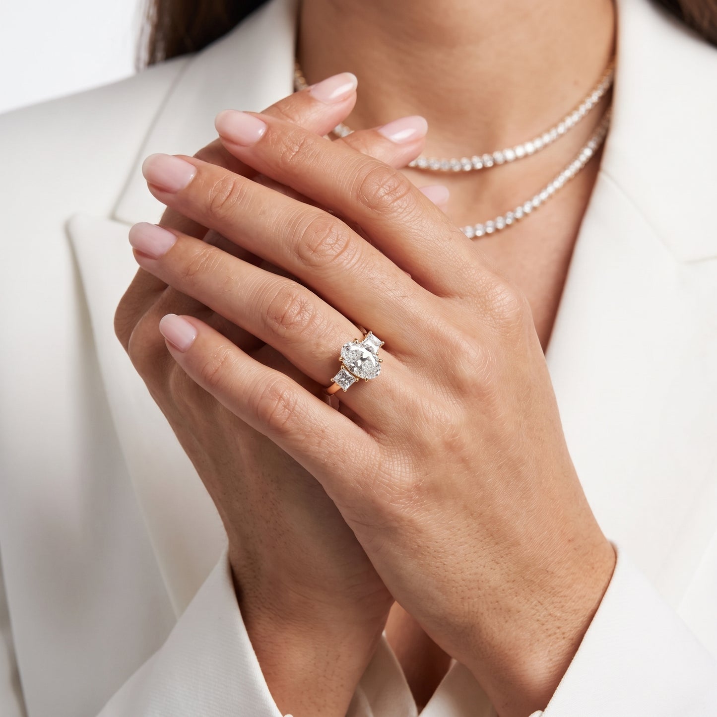 Sienna Three-Stone Oval Diamond Ring in Yellow Gold - model.jpg