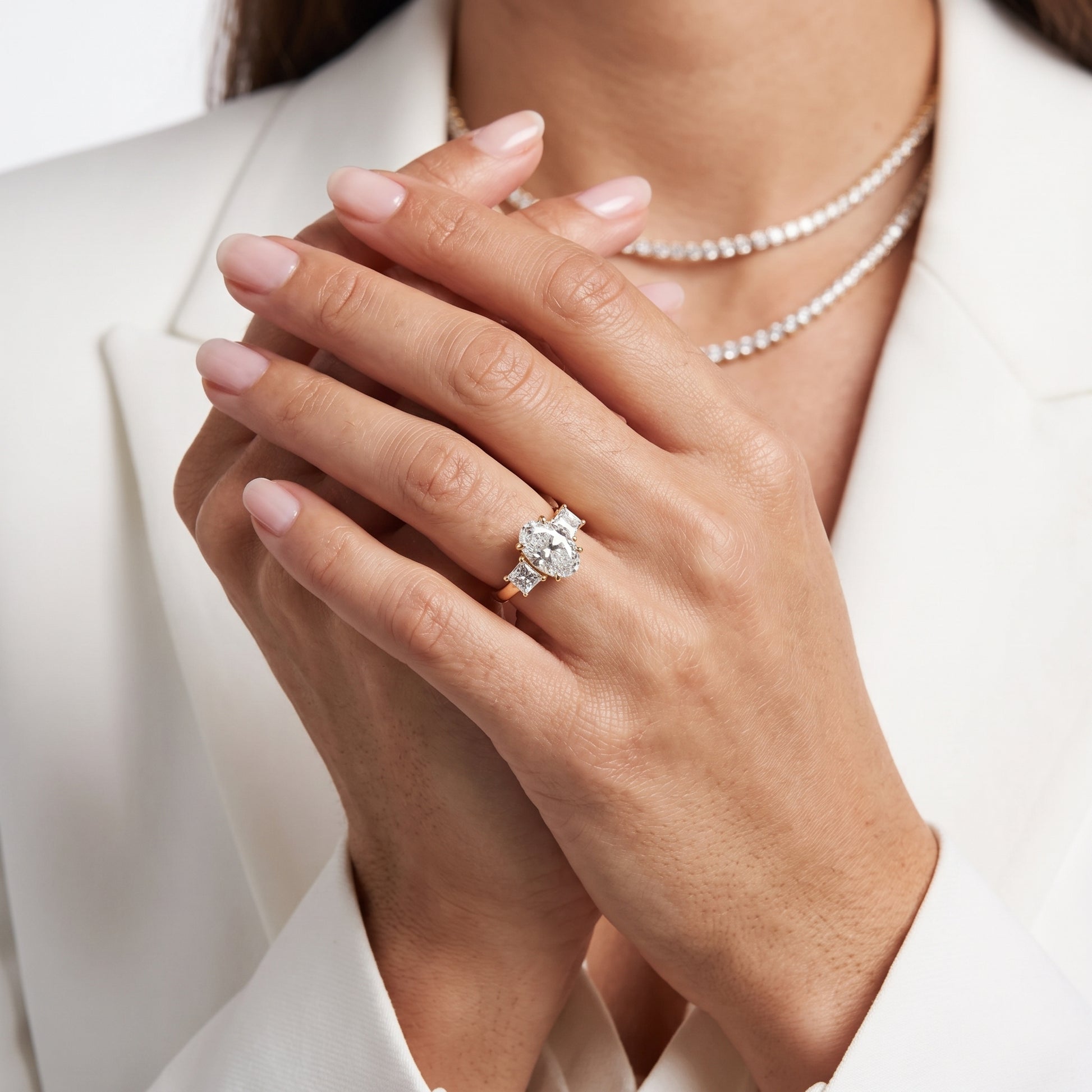 Sienna Three-Stone Oval Diamond Ring in Yellow Gold - model.jpg