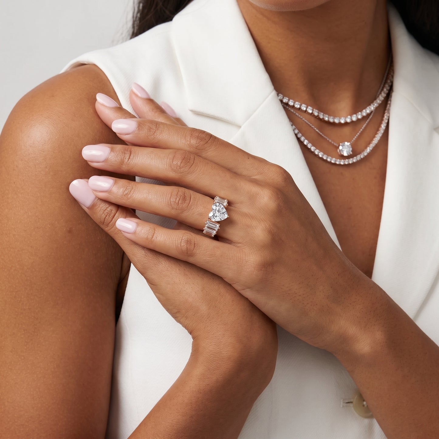 Mara Sidestone Baguette Accent Heart Diamond Engagement Ring in Rose Gold - model.jpg