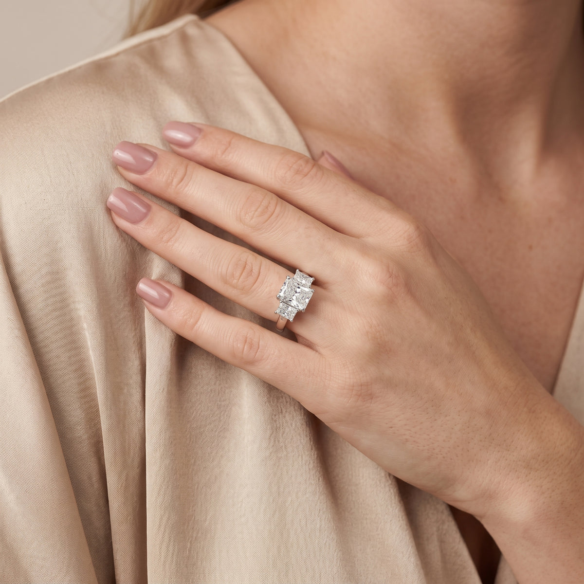 Zoe Three-Stone Radiant Diamond Engagement Ring in White Gold - model.jpg