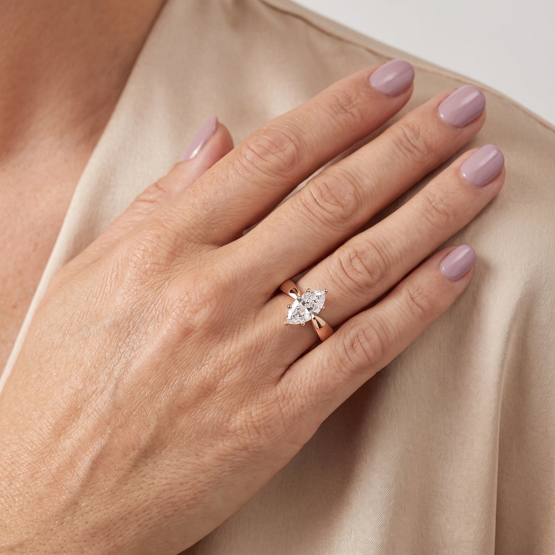 Talia Solitaire Twist Marquise Diamond Engagement Ring in Rose Gold - model.jpg