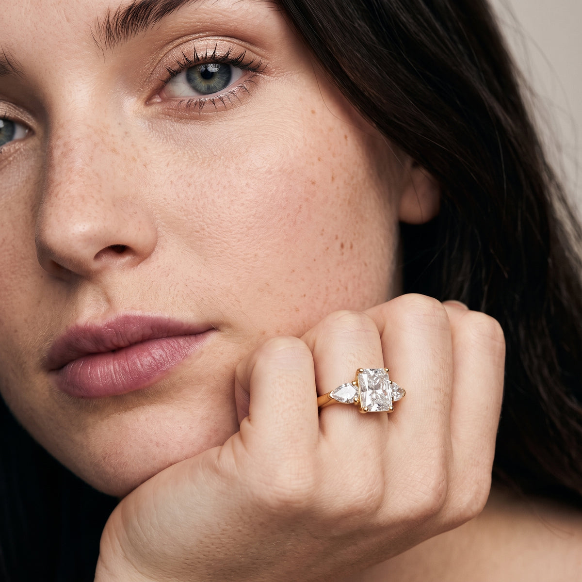 Sophia Three-Stone Radiant Diamond Engagement Ring in Yellow Gold - model.jpg