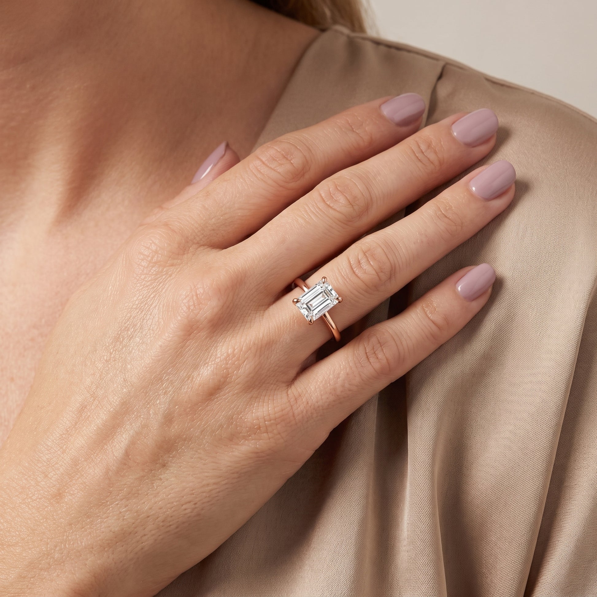 Nella Petite Solitaire Emerald Diamond Engagement Ring in Rose Gold - model.jpg