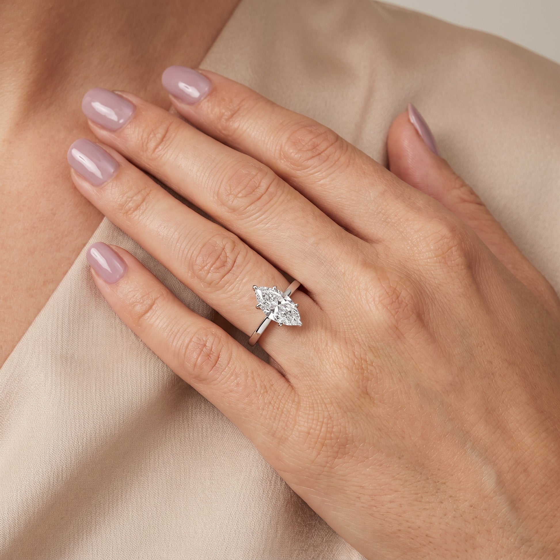 Kaia Solitaire Marquise Diamond Ring in Platinum - model.jpg
