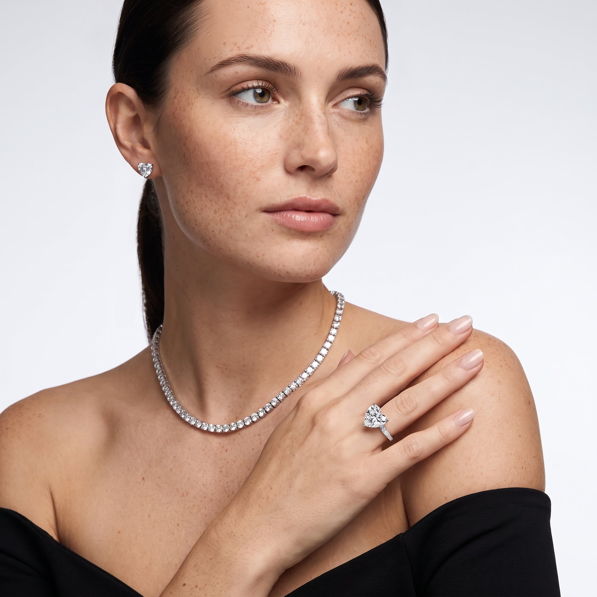 Maren Sidestone Channel Set Heart Diamond Engagement Ring in Platinum - model.jpg