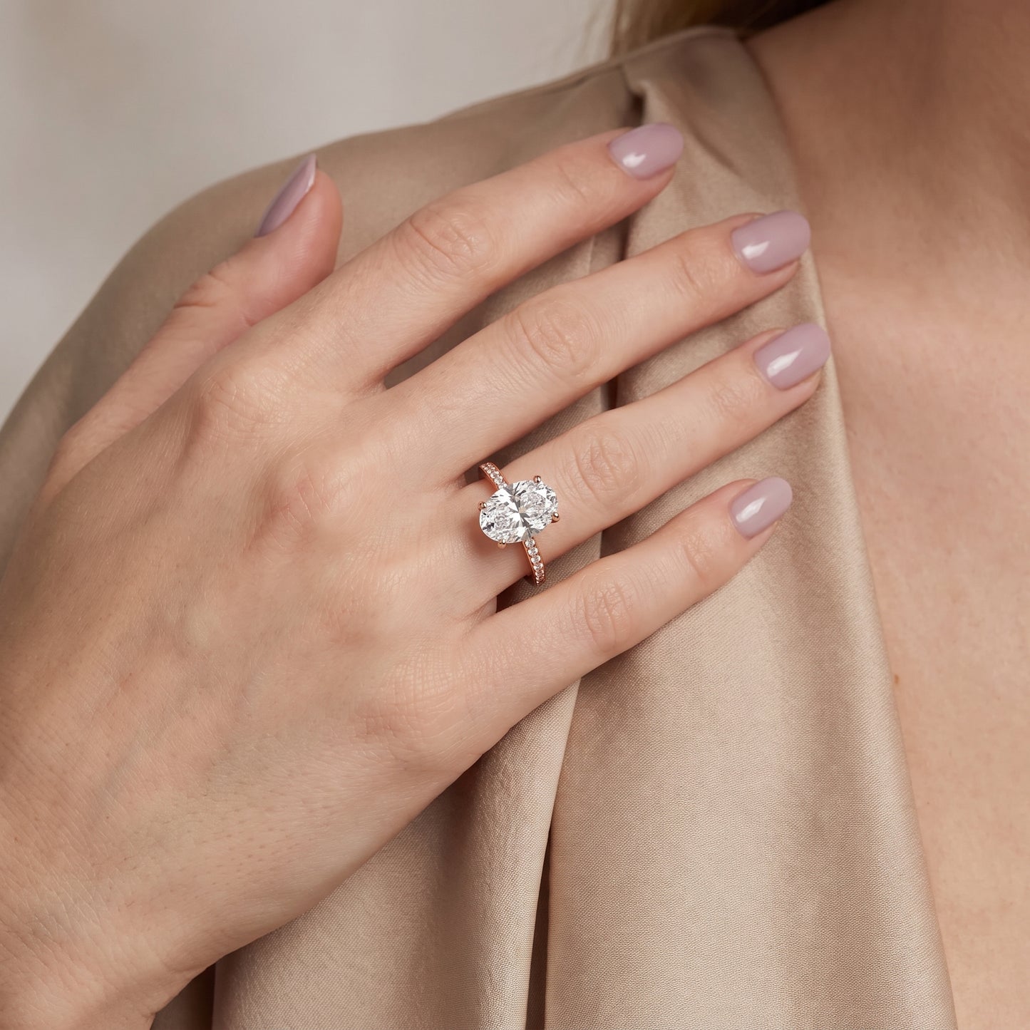 Naia Hidden Halo Oval Diamond Ring in Rose Gold - model.jpg