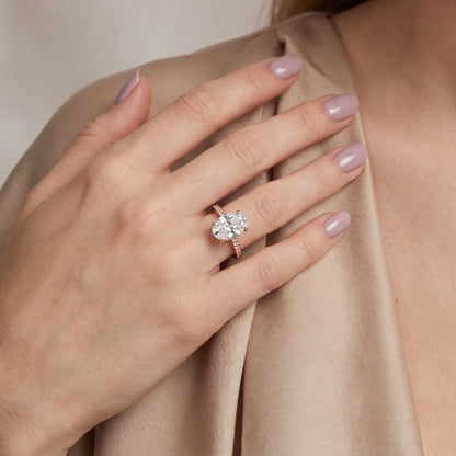 Naia Hidden Halo Oval Diamond Ring in Rose Gold - model.jpg
