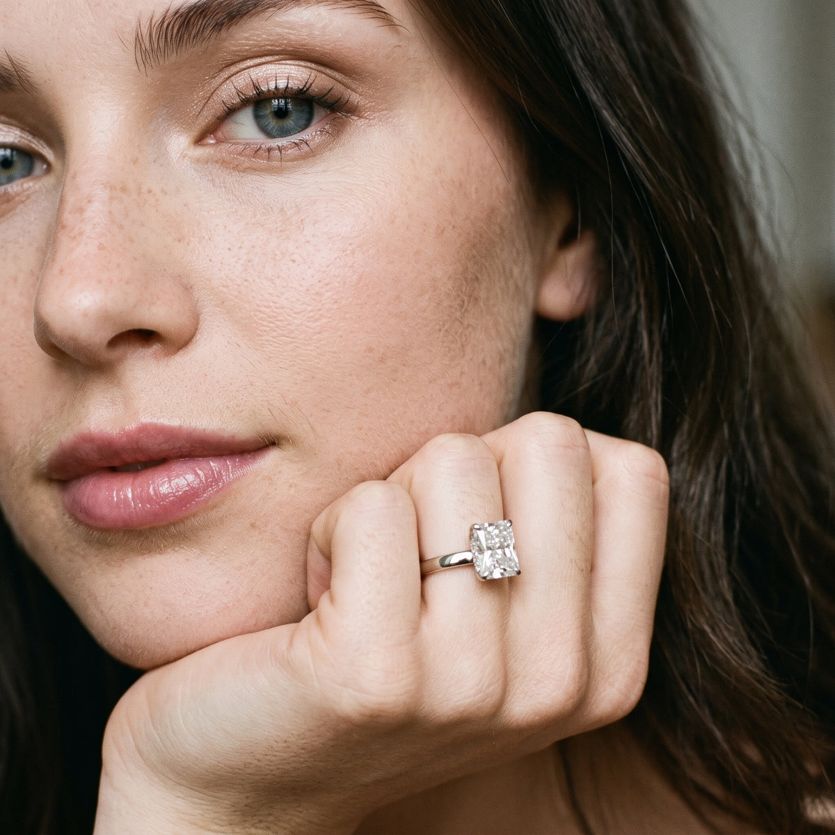 Lara Hidden Halo Radiant Diamond Engagement Ring in Silver - model.jpg