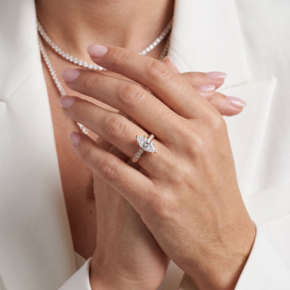 Tessa Solitaire Channel Set Marquise Diamond Engagement Ring in Rose Gold - model.jpg