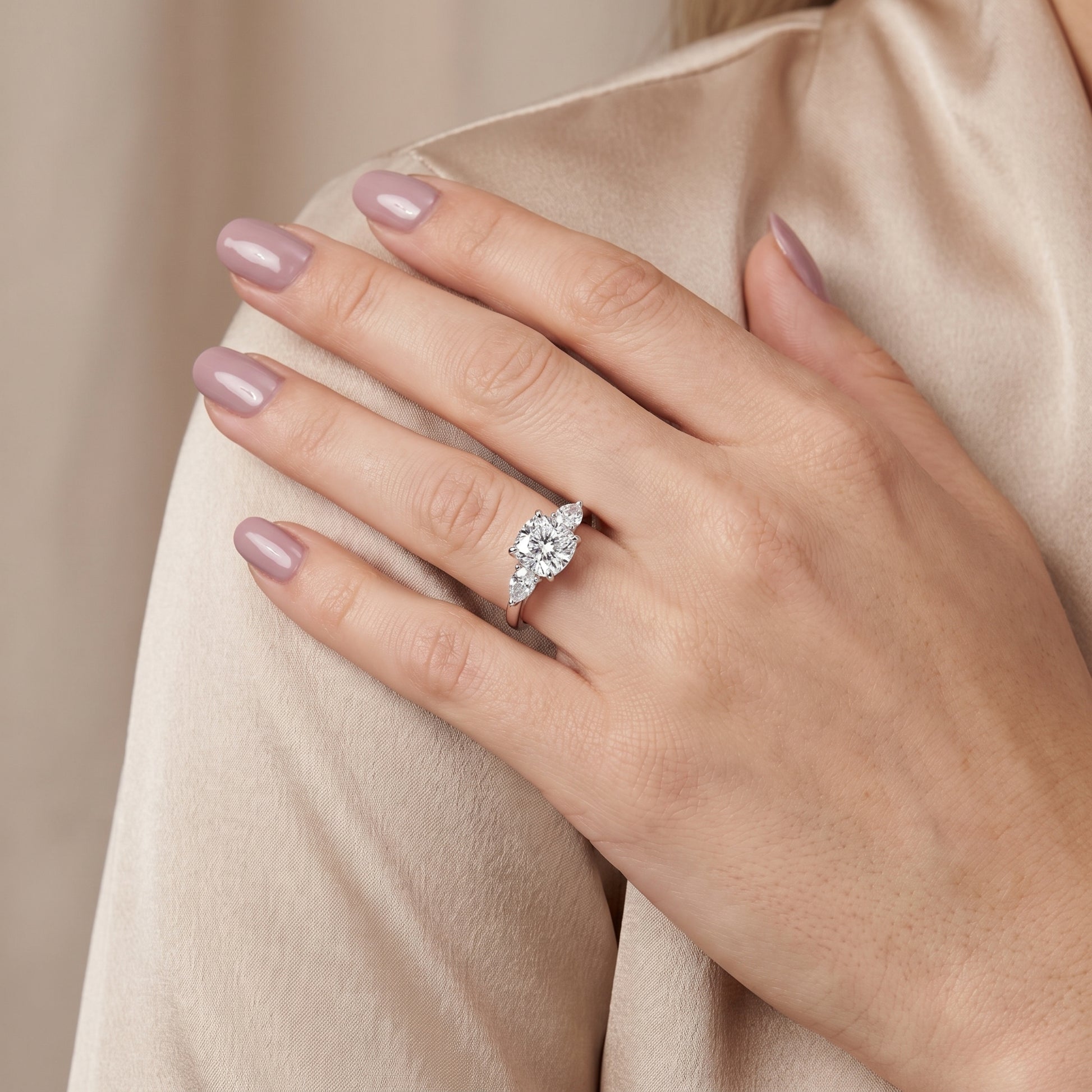 Phoebe Three-Stone Cushion Diamond Ring in Platinum - model.jpg
