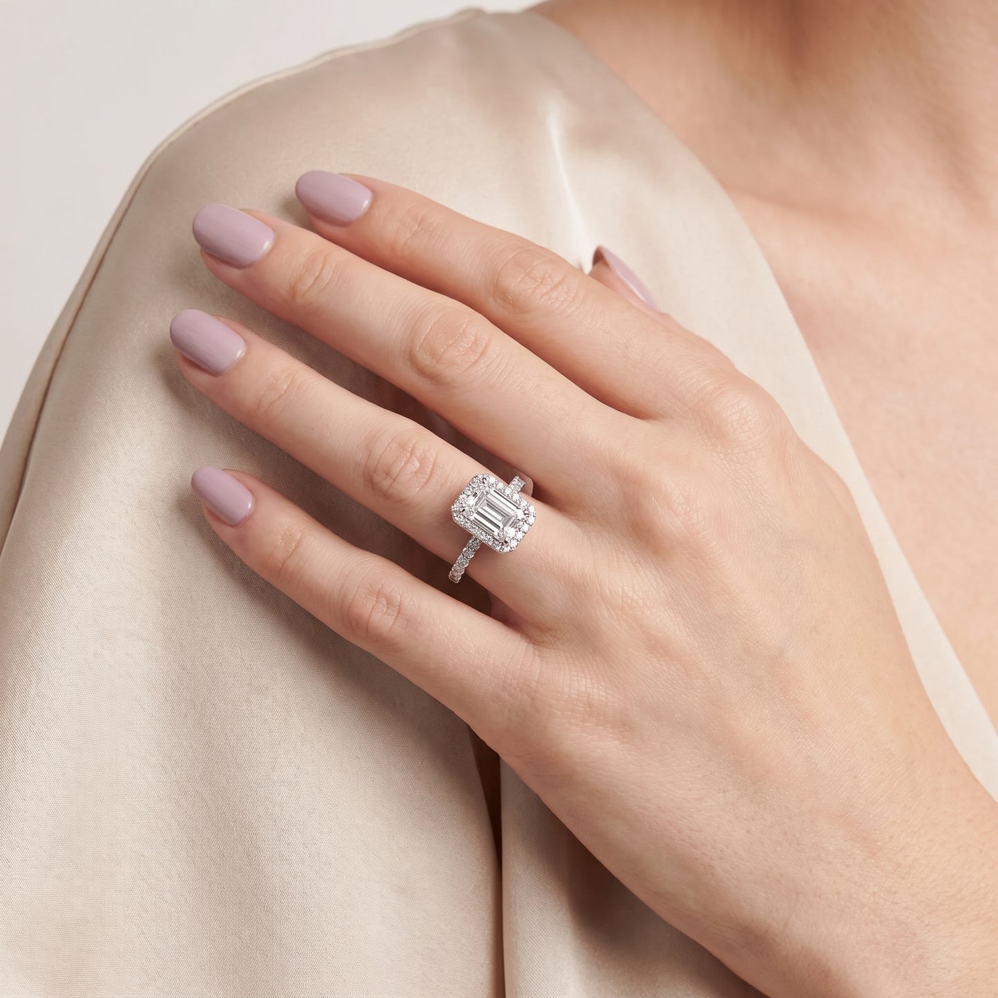 Chloe Halo Pavé Emerald Diamond Ring in Platinum - model.jpg