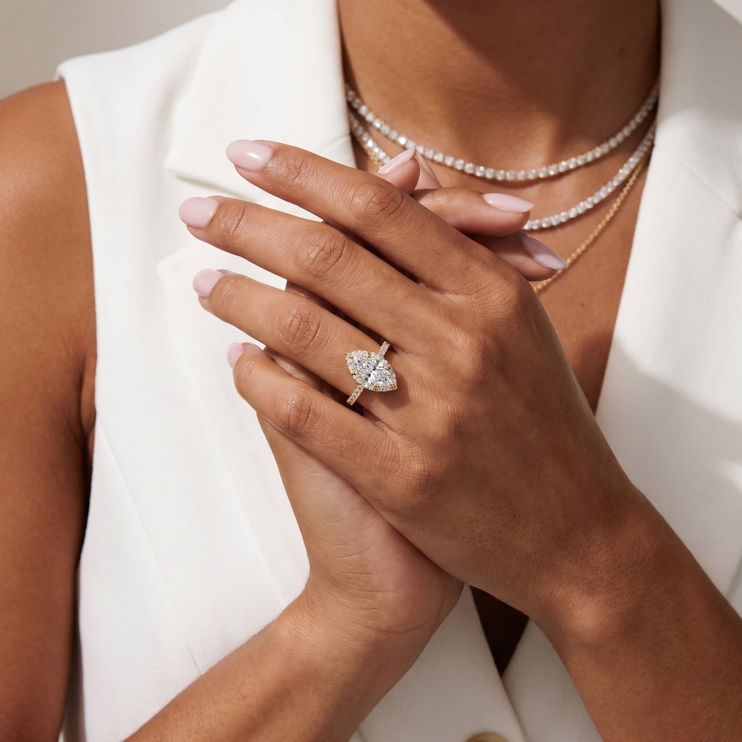Amara Halo Claw Prong Marquise Diamond Ring in Yellow Gold - model.jpg