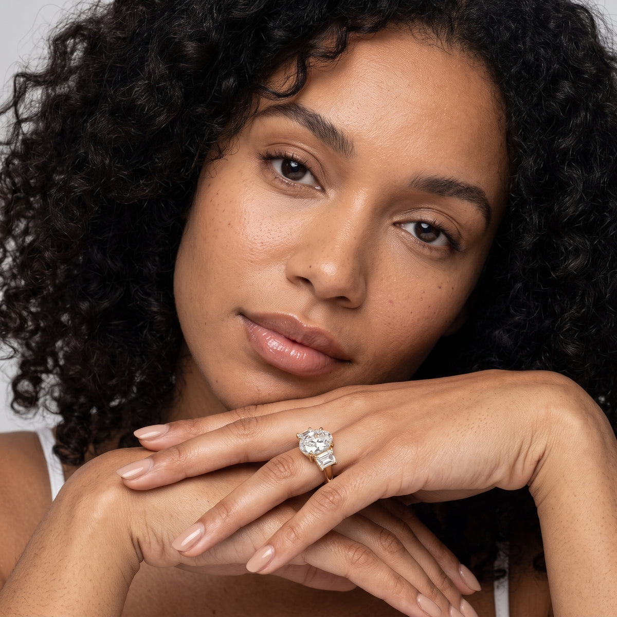 Filippa Trapezoid Three-Stone Oval Diamond Engagement Ring in Platinum - model.jpg