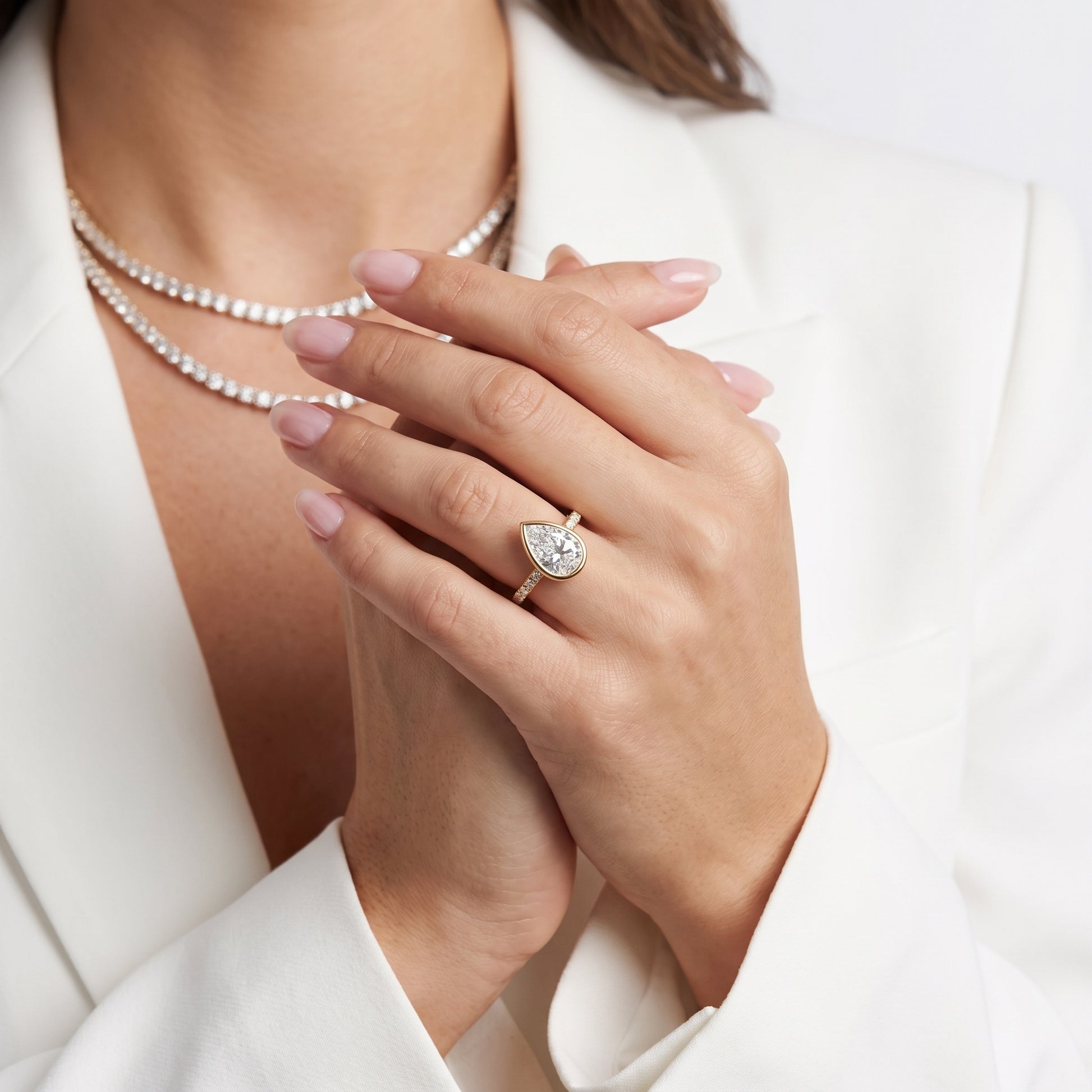 Cora Bezel Pavé Pear Diamond Ring in Yellow Gold - model.jpg