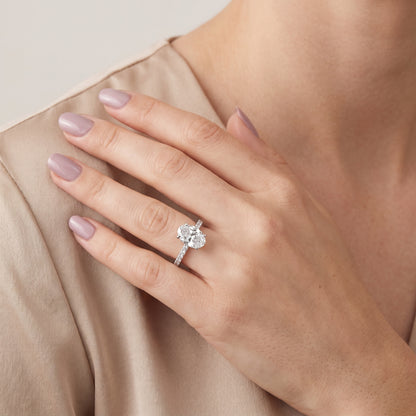 Aisha Pavé Solitaire Oval Diamond Engagement Ring in Silver - model.jpg