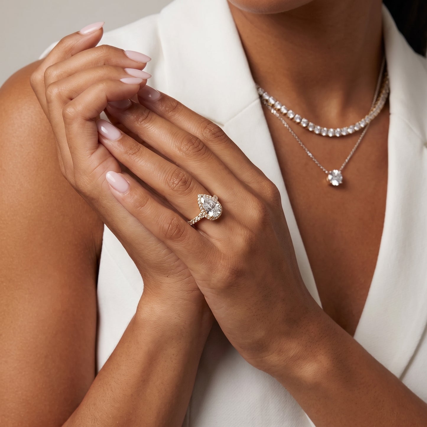 Bella Halo Pavé Pear Diamond Engagement Ring in Yellow Gold - model.jpg